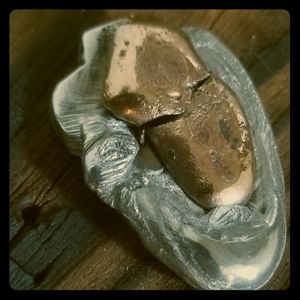 Aluminum and bronze abstract pendant